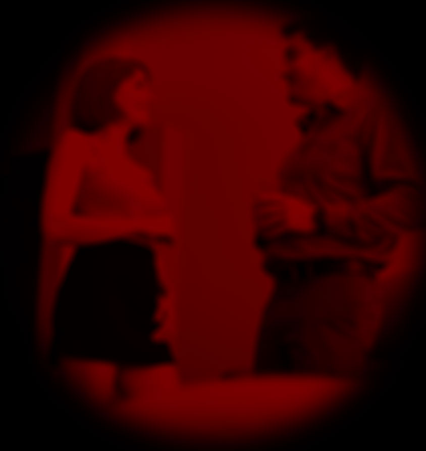 Redhead talking to me in her office at the house warming